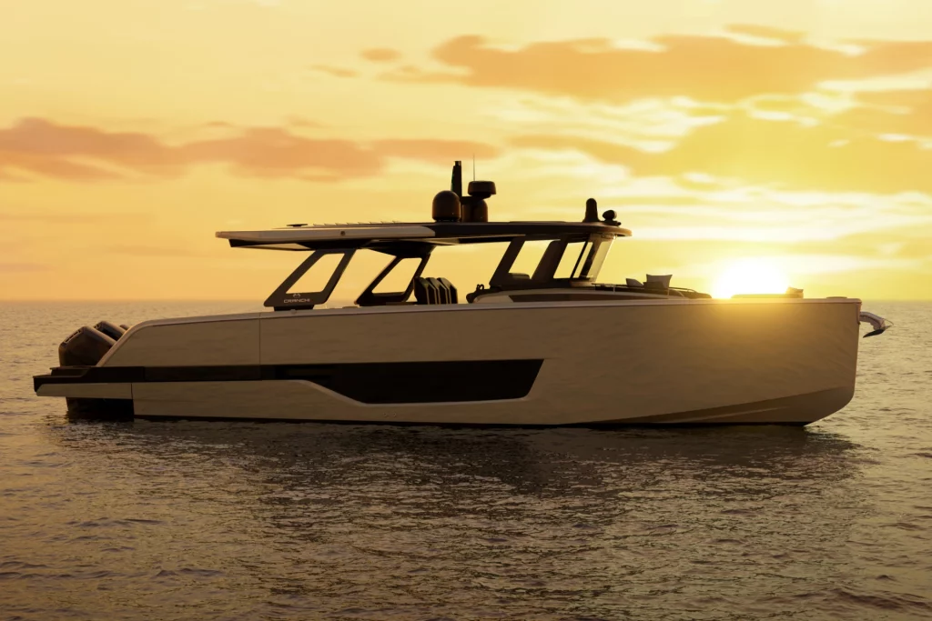 Profilo laterale completo del Cranchi A48 O/B al tramonto, con hard top e linee moderne dello scafo.