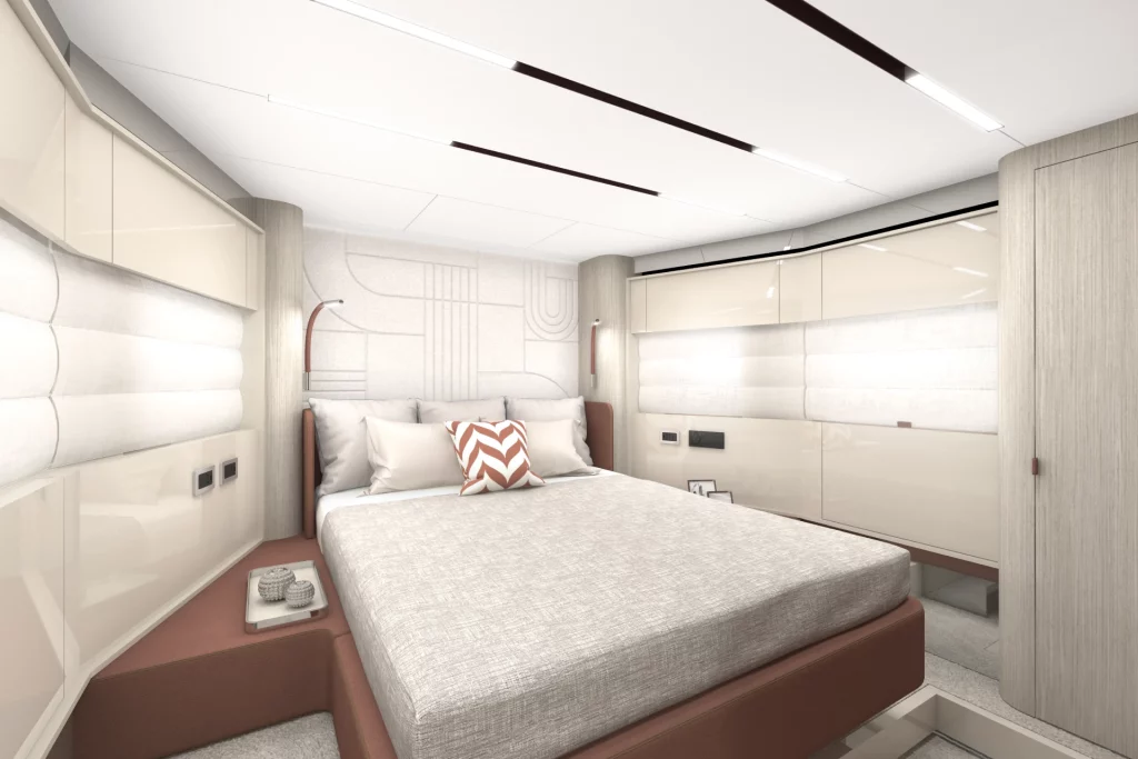Cabina VIP del Cranchi A64 con letto matrimoniale, arredi chiari, ampie superfici imbottite e illuminazione lineare.