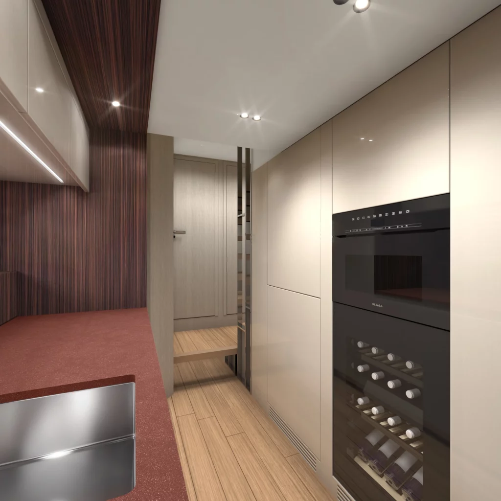 Cucina interna del Cranchi A64 con piano di lavoro, forno integrato, cantinetta vini e mobili a tutta altezza.