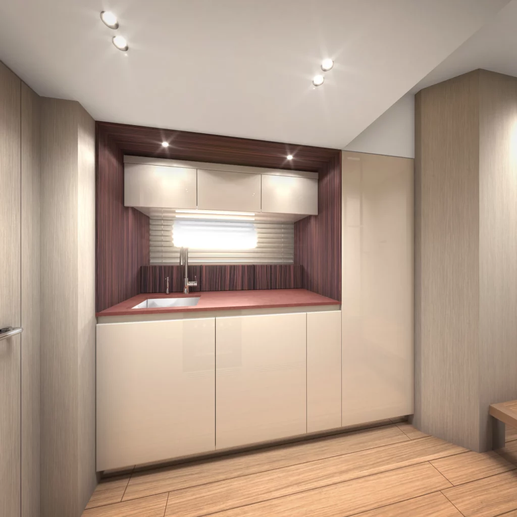 Cucina del Cranchi A64 con lavello, piano di lavoro, pensili e mobili contenitore dalle finiture contemporanee.